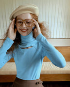 タートルネックデザイントップス