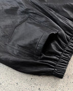 フェイクレザーミディパンツ