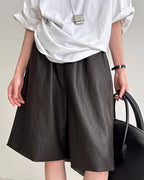 フェイクレザーミディパンツ