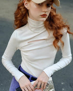 タートルネックデザイントップス - ivonir